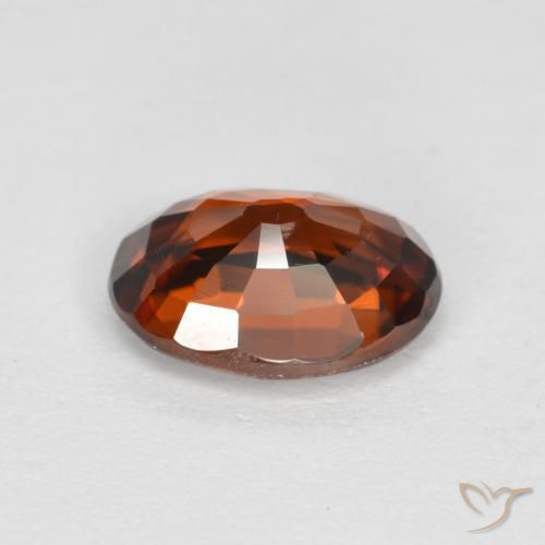 Zircon Orange rougeâtre naturelle ovale, 1.85 ct, VVS