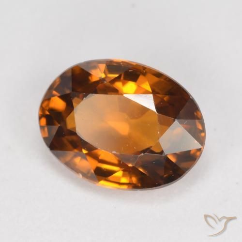Zircon Orange brunâtre foncé naturelle ovale, 1.62 ct, VVS