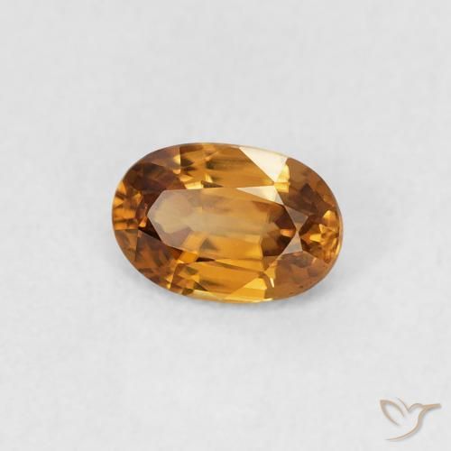 Zircon Orange brun naturelle ovale, 0.66 ct, VVS