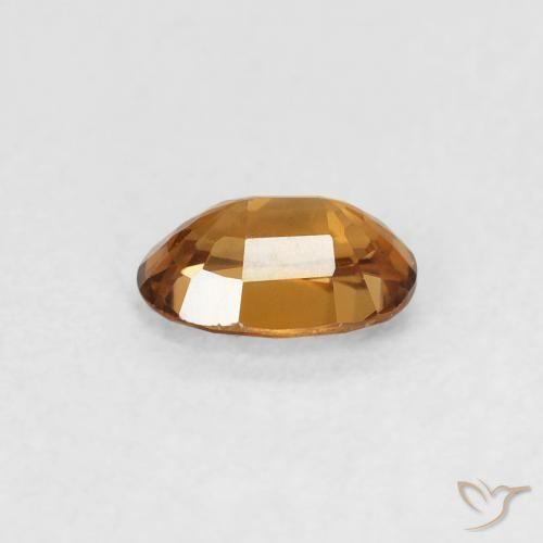 Zircon Orange brun naturelle ovale, 0.66 ct, VVS
