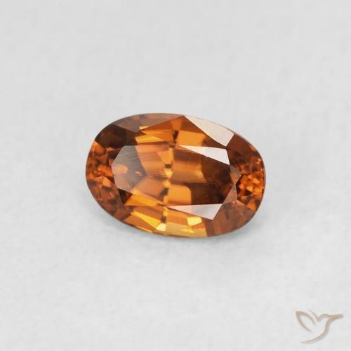 Zircon Medium Dark-Orange naturelle ovale, 0.82 ct, VVS