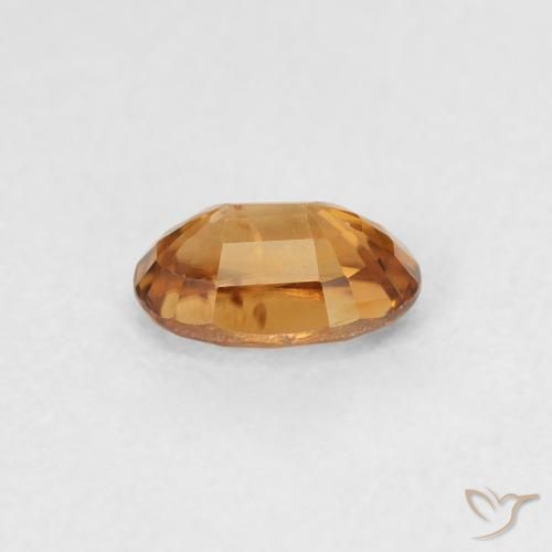 Zircon Orange moyen naturelle ovale, 0.73 ct, VVS