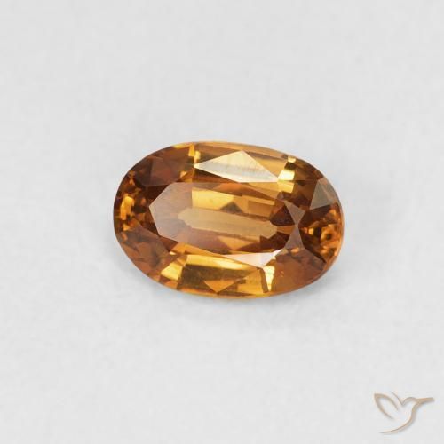 Zircon Orange brun naturelle ovale, 0.67 ct, VVS