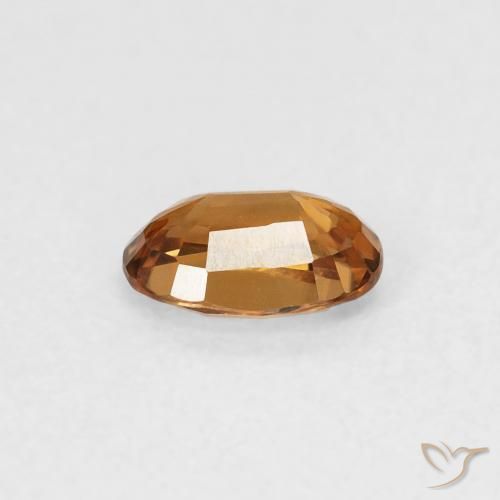Zircon Orange brun naturelle ovale, 0.67 ct, VVS