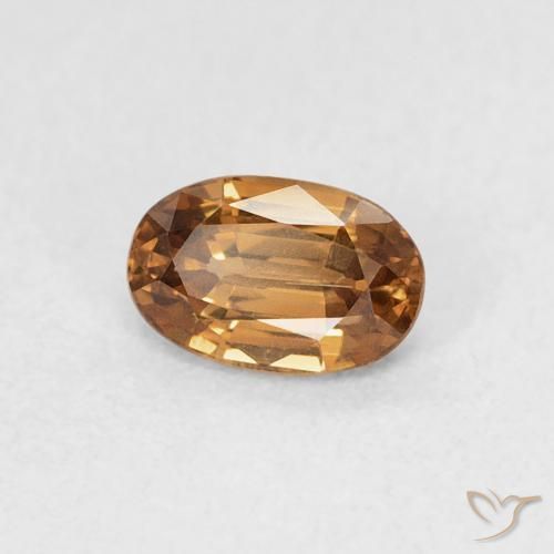 Zircon Orange brunâtre naturelle ovale, 0.77 ct, VVS