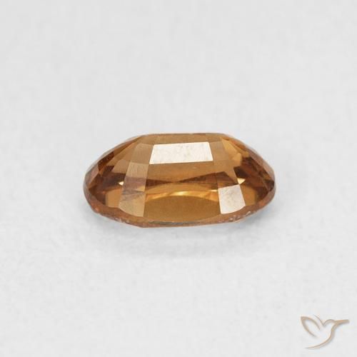 Zircon Orange brunâtre naturelle ovale, 0.77 ct, VVS