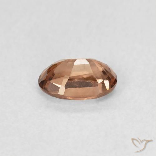 Zircon Orange foncé naturelle ovale, 0.67 ct, VVS