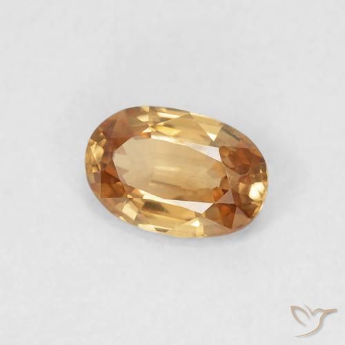 Zircon Orange brunâtre naturelle ovale, 0.65 ct, VVS