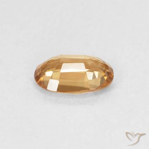 Zircon Orange brunâtre naturelle ovale, 0.65 ct, VVS