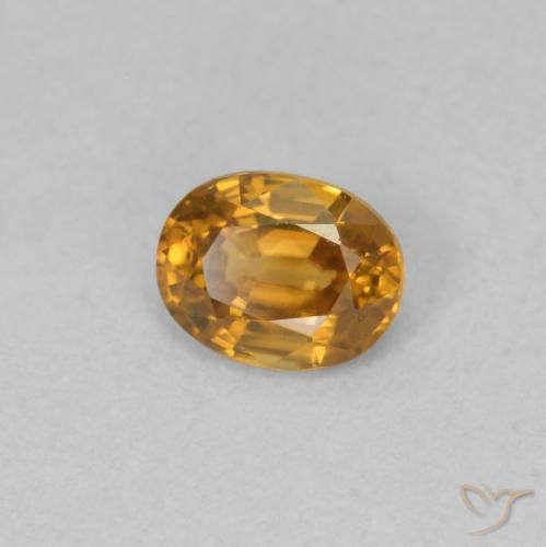Zircon Orange brun naturelle ovale, 0.59 ct, VVS-VS