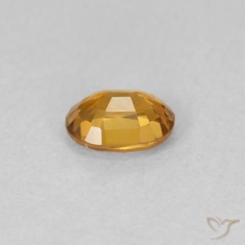 Zircon Orange brun naturelle ovale, 0.59 ct, VVS-VS