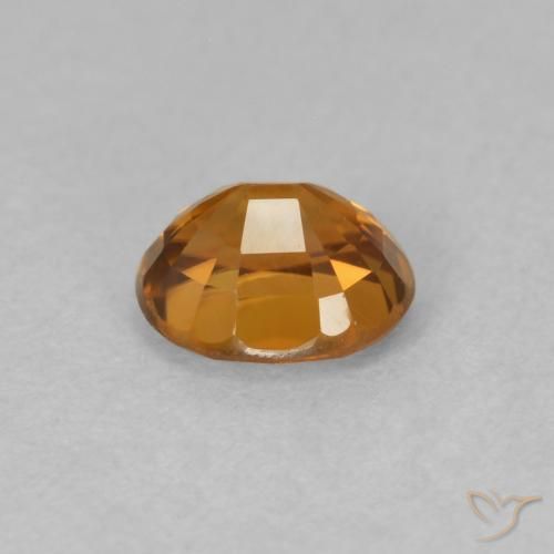 Zircon Orange brunâtre naturelle ovale, 1.04 ct, VVS-VS