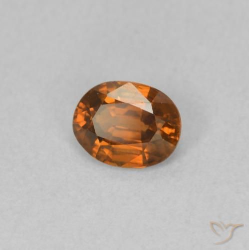 Zircon Orange foncé naturelle ovale, 0.59 ct, VVS-VS