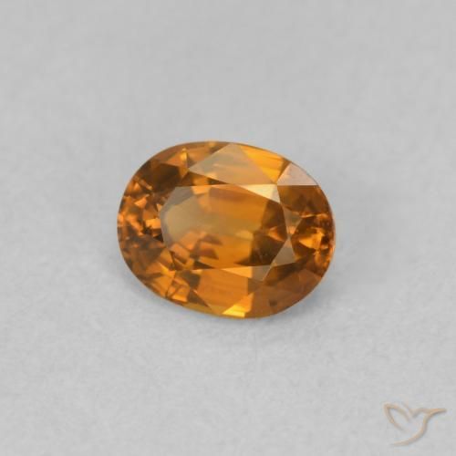 Zircon Orange foncé naturelle ovale, 0.60 ct, VVS-VS