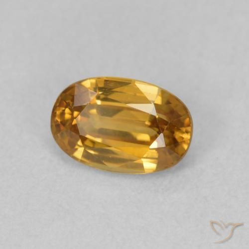Zircon Orange foncé naturelle ovale, 0.78 ct, VVS-VS