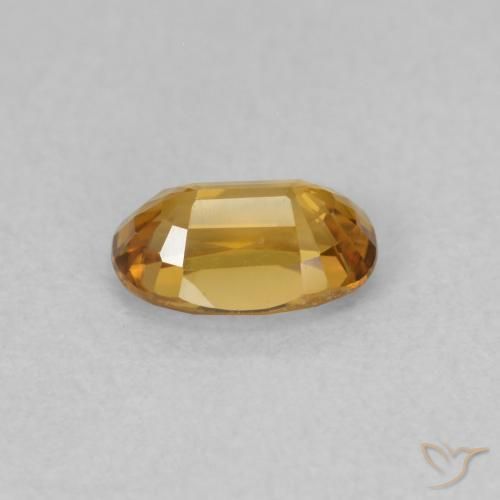 Zircon Orange foncé naturelle ovale, 0.78 ct, VVS-VS