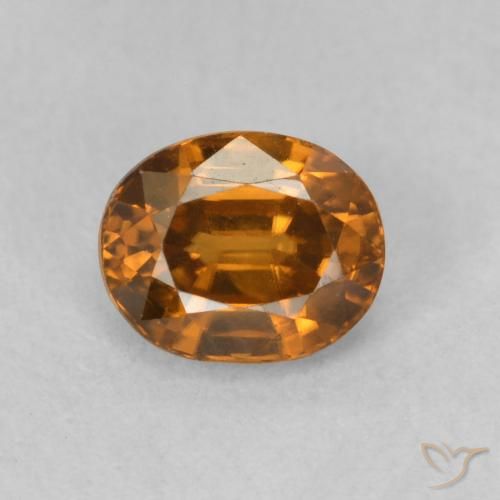 Zircon Orange brunâtre naturelle ovale, 1.02 ct, VVS-VS