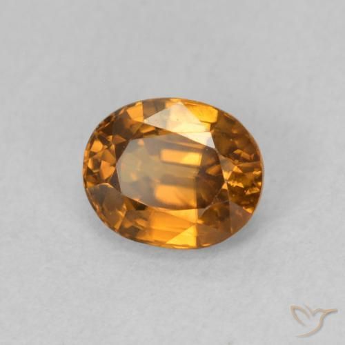 Zircon Orange brunâtre naturelle ovale, 1.02 ct, VVS-VS