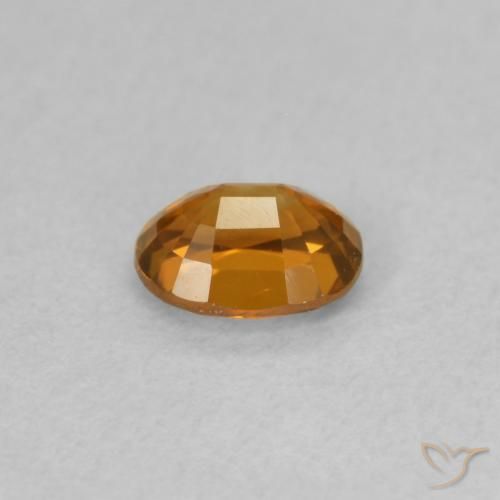 Zircon Orange moyen naturelle ovale, 0.63 ct, VVS-VS