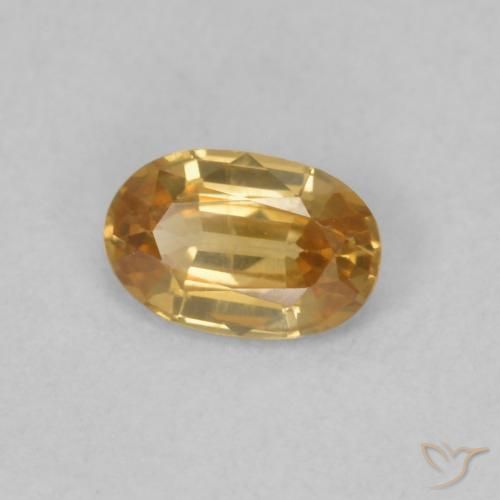 Zircon Orange doré naturelle ovale, 0.63 ct, VVS-VS