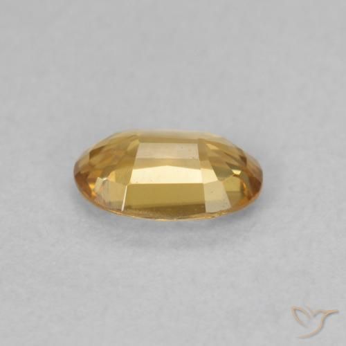 Zircon Orange doré naturelle ovale, 0.63 ct, VVS-VS