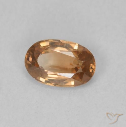 Zircon Orange-doré naturelle ovale, 0.64 ct, VVS-VS