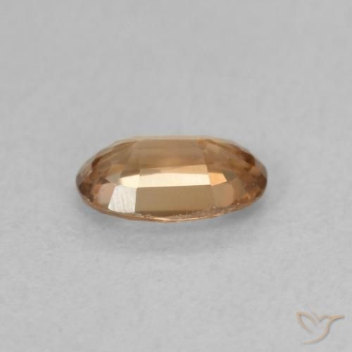 Zircon Orange-doré naturelle ovale, 0.64 ct, VVS-VS