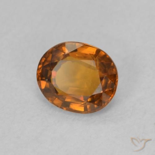 Zircon Orange foncé naturelle ovale, 0.88 ct, VVS-VS