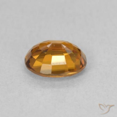 Zircon Orange foncé naturelle ovale, 0.88 ct, VVS-VS