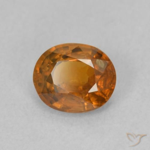 Zircon Orange foncé naturelle ovale, 0.96 ct, VS