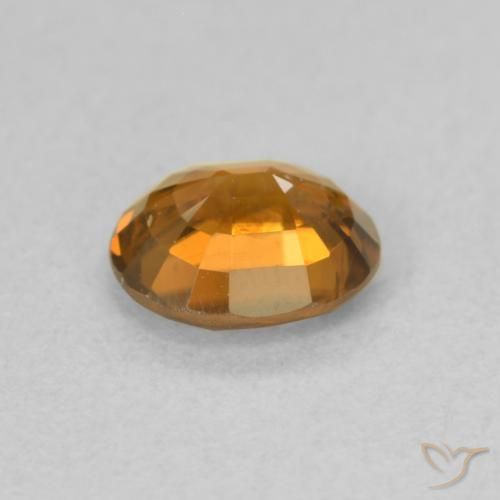 Zircon Orange foncé naturelle ovale, 0.96 ct, VS
