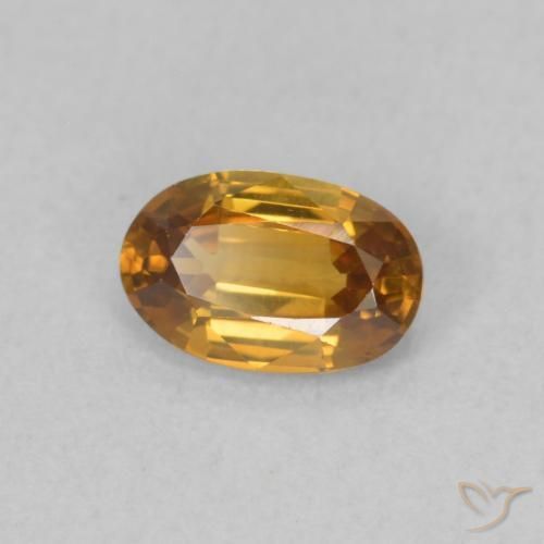 Zircon Orange moyen naturelle ovale, 0.63 ct, VVS-VS