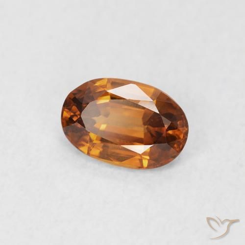 Zircon Orange terre naturelle ovale, 0.66 ct, VS