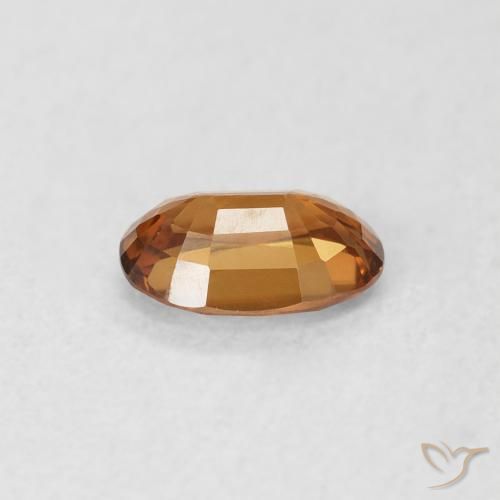 Zircon Orange terre naturelle ovale, 0.66 ct, VS