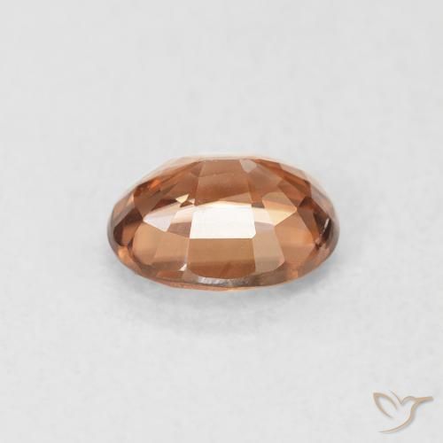 Zircon Orange rouge foncé naturelle ovale, 0.93 ct, VS