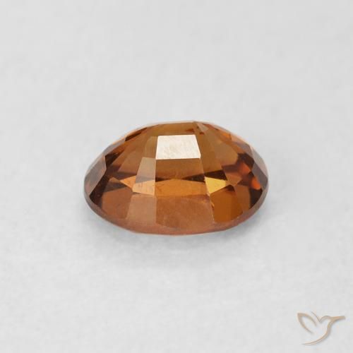 Zircon Orange terre naturelle ovale, 1.01 ct, VS