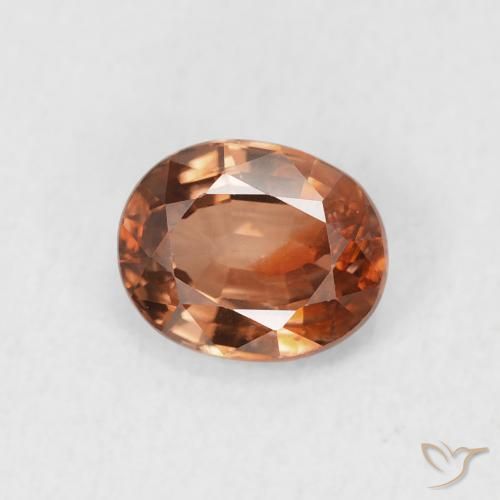 Zircon Orange foncé naturelle ovale, 1.02 ct, VS