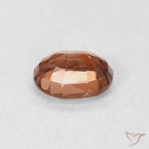 Zircon Orange foncé naturelle ovale, 1.02 ct, VS