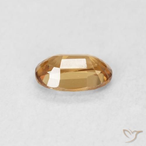 Zircon Orange rouille naturelle ovale, 0.69 ct, VVS-VS