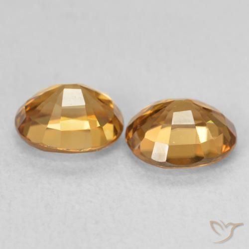 Shop natural 2.07ct Orange rouille Zircon gems, ovale, from Colombie at GemSelect. In stock, global shipping!