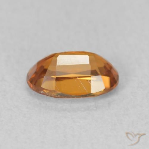 Zircon Orange brunâtre naturelle ovale, 0.73 ct, VVS-VS