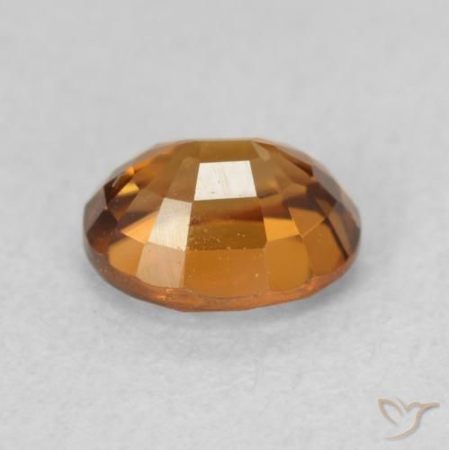 Zircon Orange brunâtre foncé naturelle ovale, 1.07 ct, VVS-VS