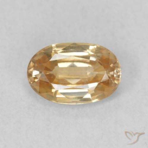 Zircon Doré pêche léger naturelle ovale, 0.70 ct, VVS-VS