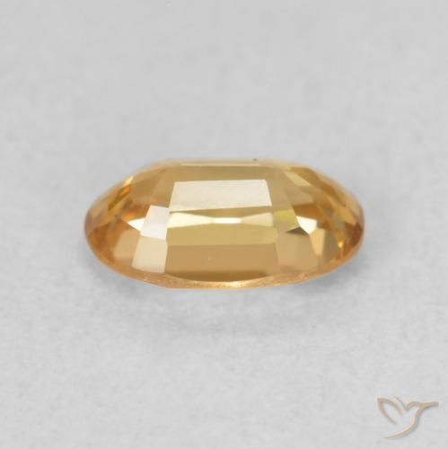 Zircon Doré pêche léger naturelle ovale, 0.68 ct, VVS-VS