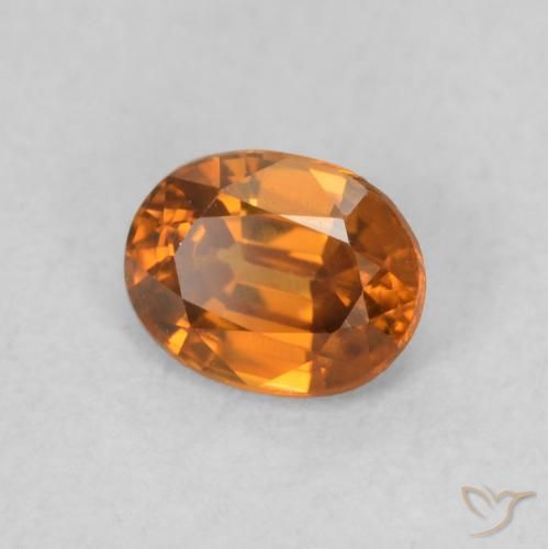 Zircon Orange foncé naturelle ovale, 0.60 ct, VVS-VS