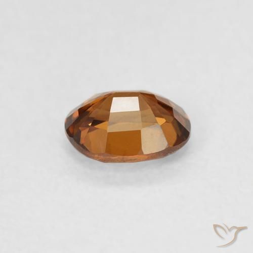 Zircon Ambre orange naturelle ovale, 0.62 ct, VVS