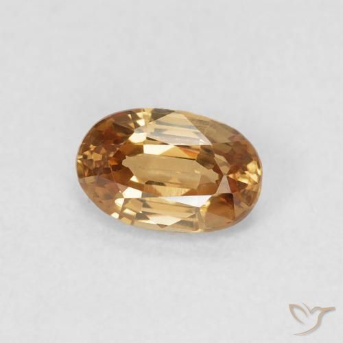 Zircon Pêche doré naturelle ovale, 0.71 ct, VVS