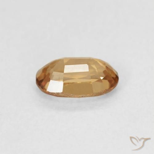 Zircon Pêche doré naturelle ovale, 0.71 ct, VVS