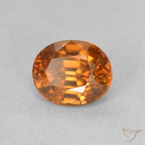 Zircon Orange foncé naturelle ovale, 1.04 ct, VS
