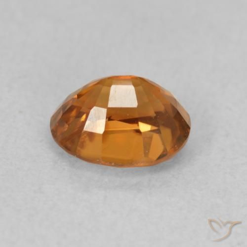 Zircon Orange foncé naturelle ovale, 1.04 ct, VS